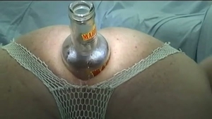 CD arse Stuffs With Bottle