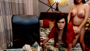 Two pretty ladyboys Cumming Hard On web camera
