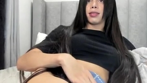 lengthy black Hair Transgirl Tugs Her gigantic shlong On cam